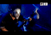 Slipknot : un des guitaristes et le chanteur...